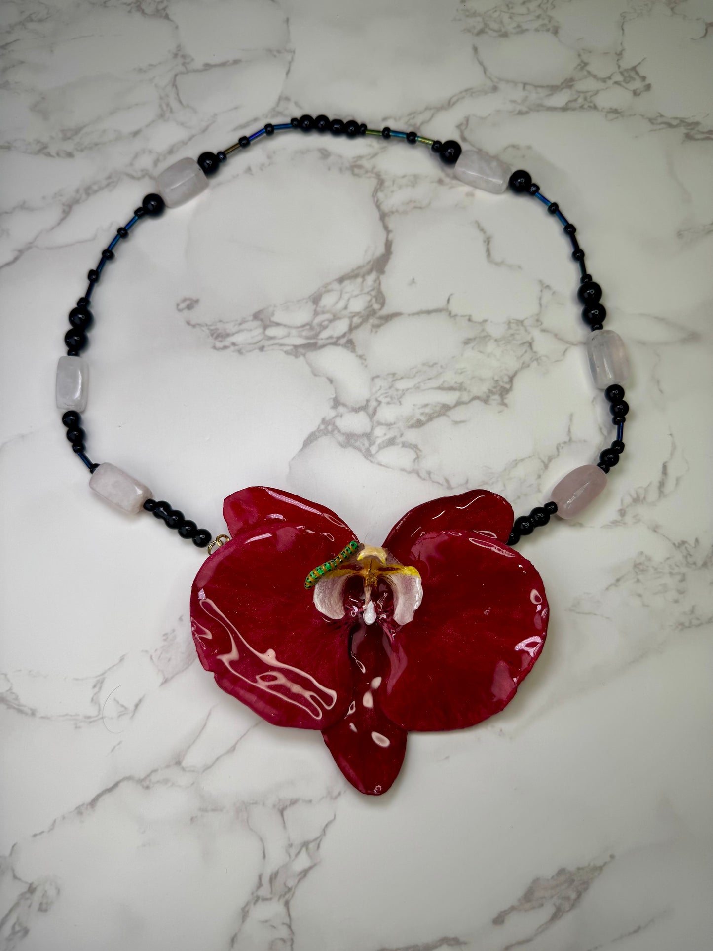 The Scarlet Garden – Orchid & Caterpillar Delight