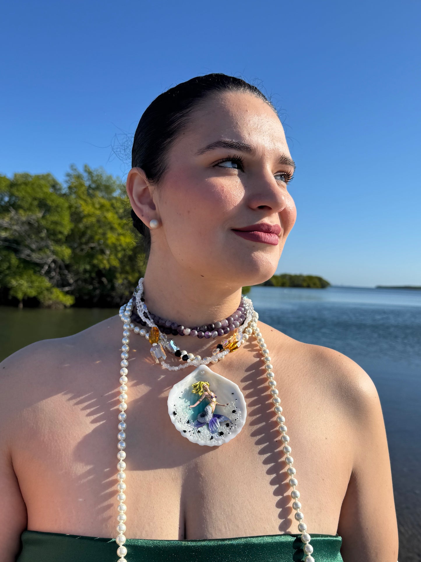 Aqualis – LIMITED EDITION – NYFW EXHIBITION PIECE Natural Seashell Art Necklace with Hand-Carved White-to-Purple Mermaid, Clear Crystals, Black Accents and Purple & Amber Crystal Necklace