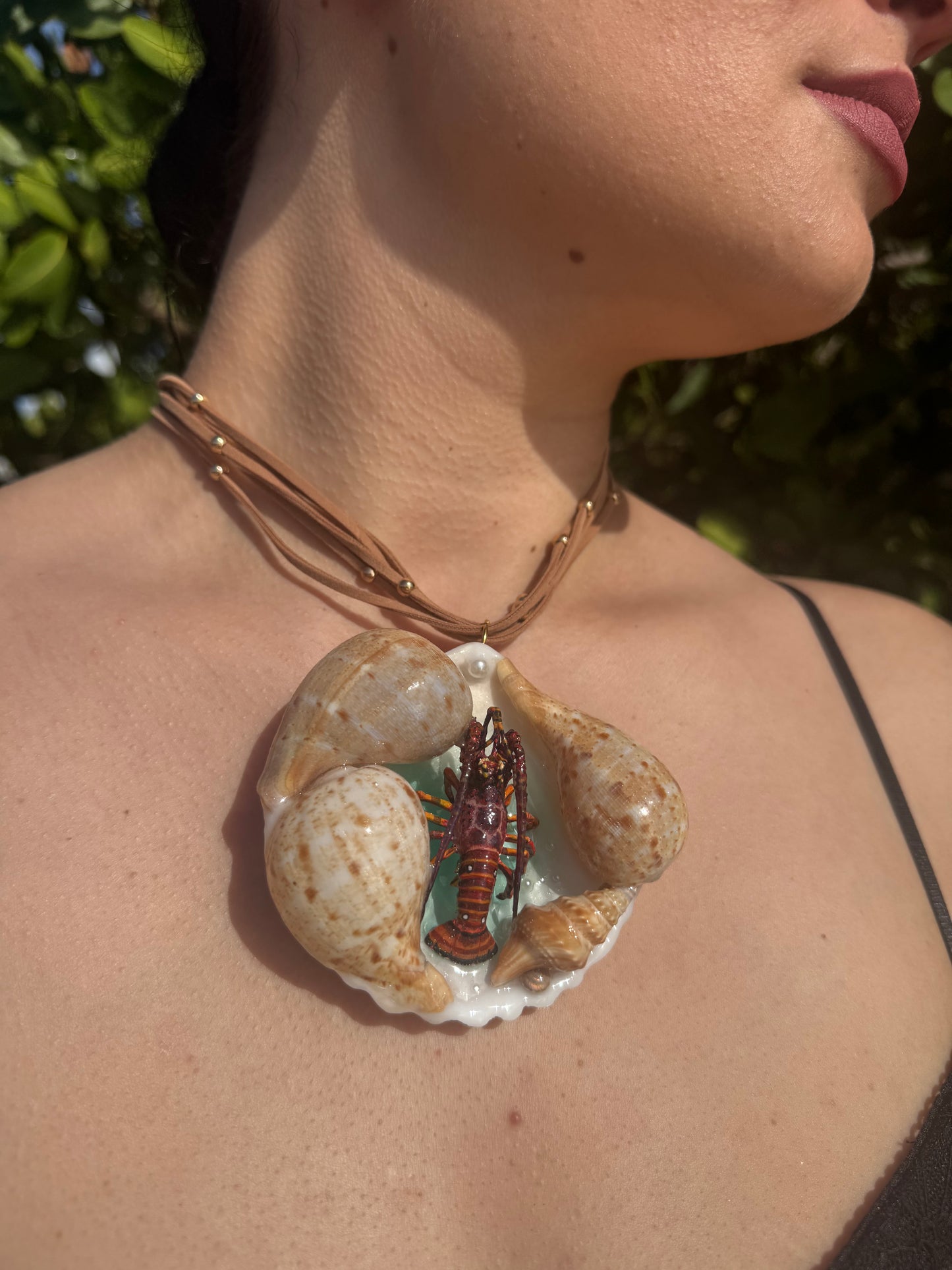 Crimson Tide Natural seashell featuring a miniature realistic lobster and tiny natural shells encapsulated in clear UV resin