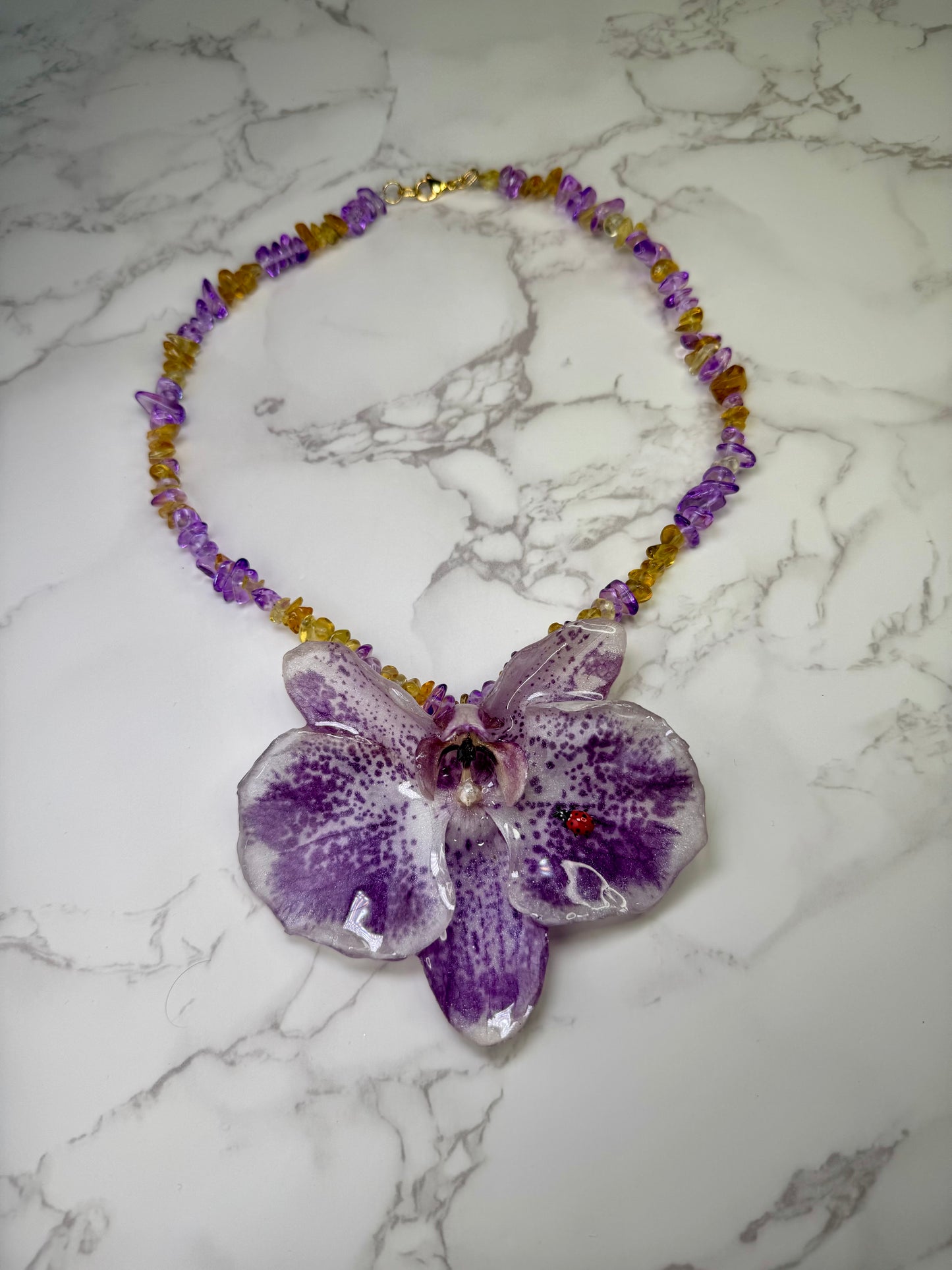 The Garden Whisper – Orchid & Ladybug Charm