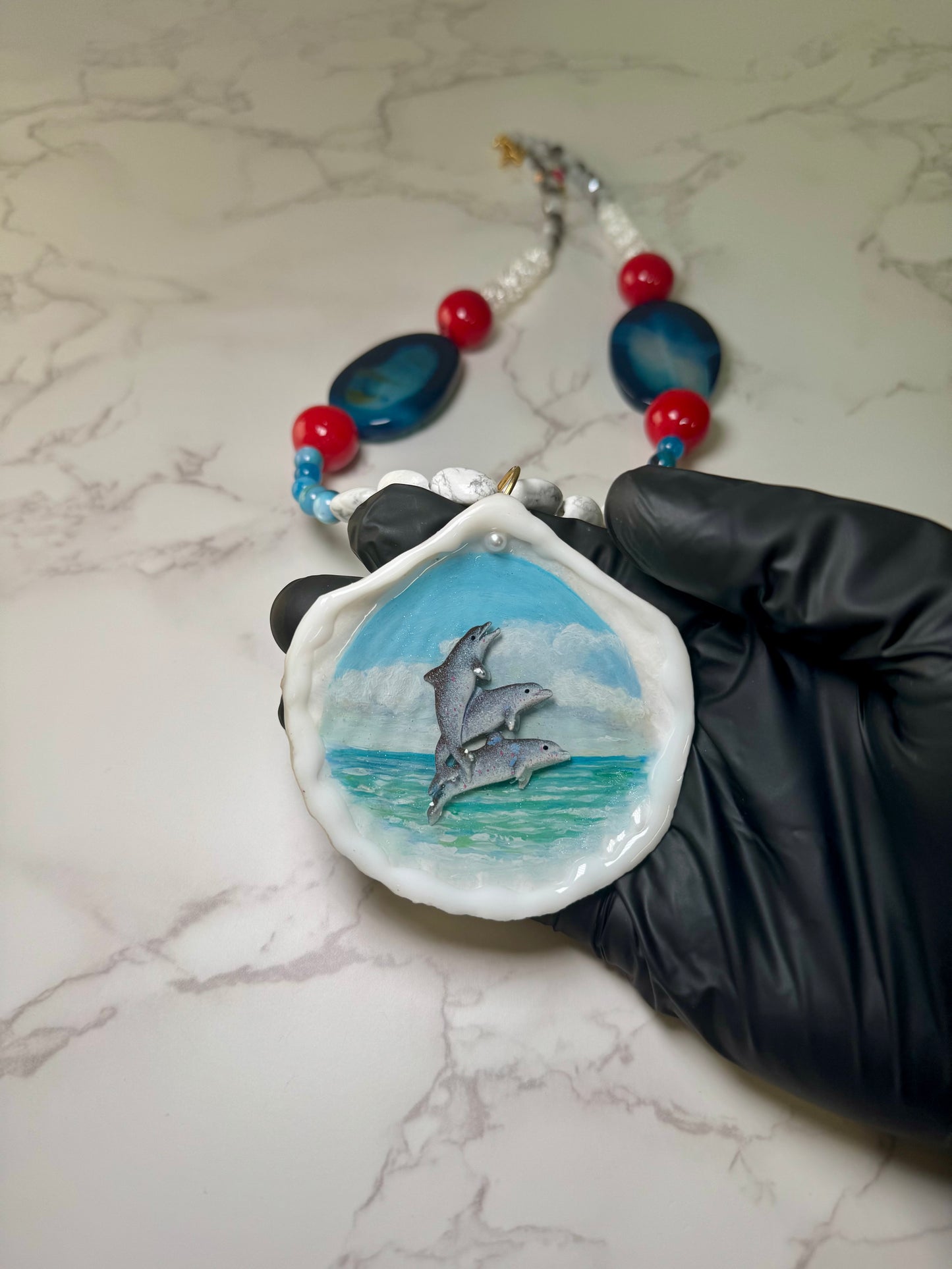 Three Dolphins Necklace Resin‑Encased Handmade Trio of Dolphins Necklace Encapsulated in Real Shell with UV Resin on Fine Colored Crystal Beads