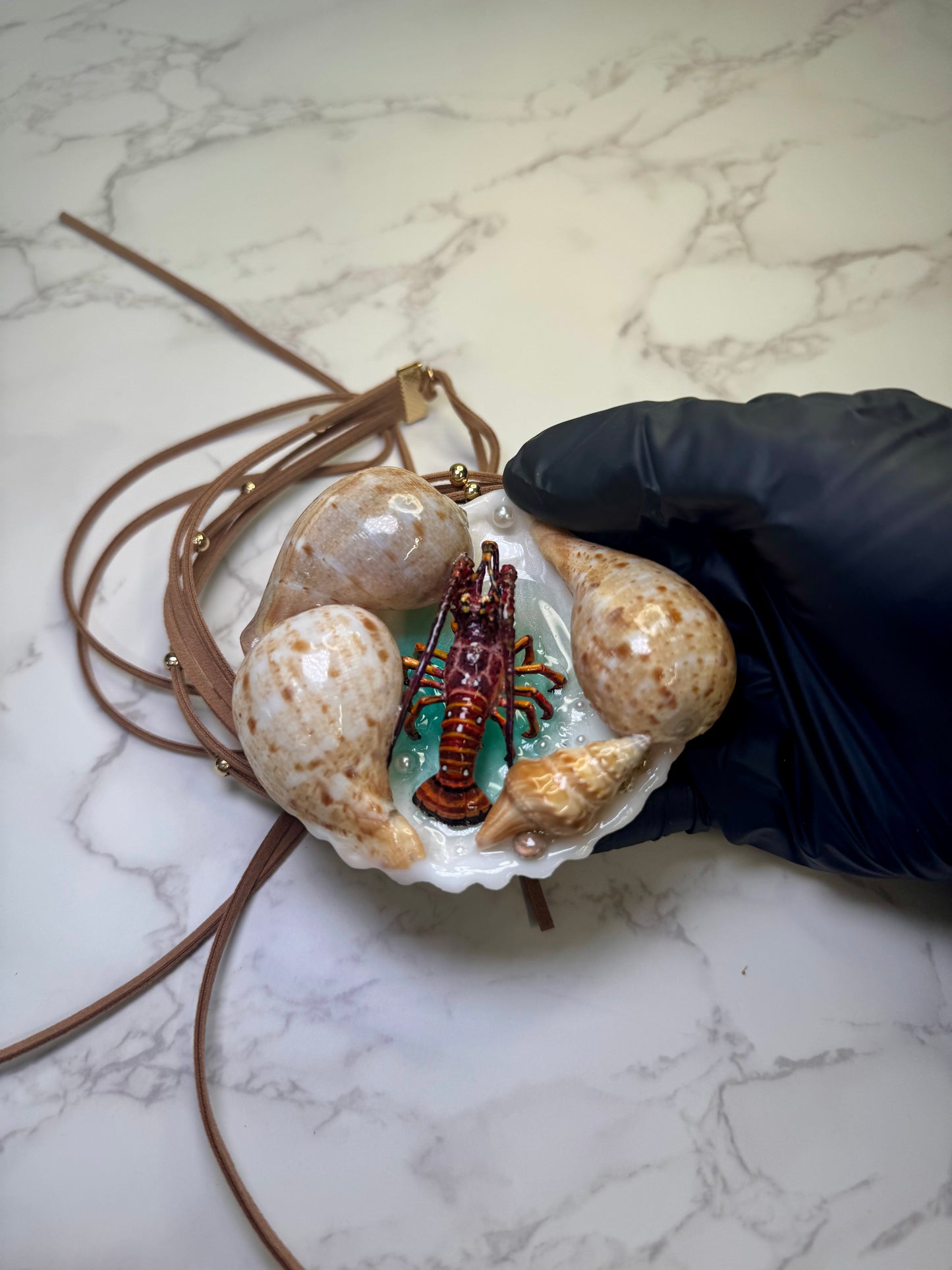 Coastal Lobster Haven Natural seashell centerpiece with a handmade craft metal realistic lobster inside preserved in clear UV resin Beautiful long triple Fabric necklace