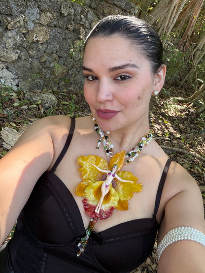 Helia – LIMITED EDITION – NYFW EXHIBITION PIECE Handmade Real Yellow Orchid Art Necklace with Hand-Carved Female Figure, Freshwater Pearls and Multitone Crystal Details
