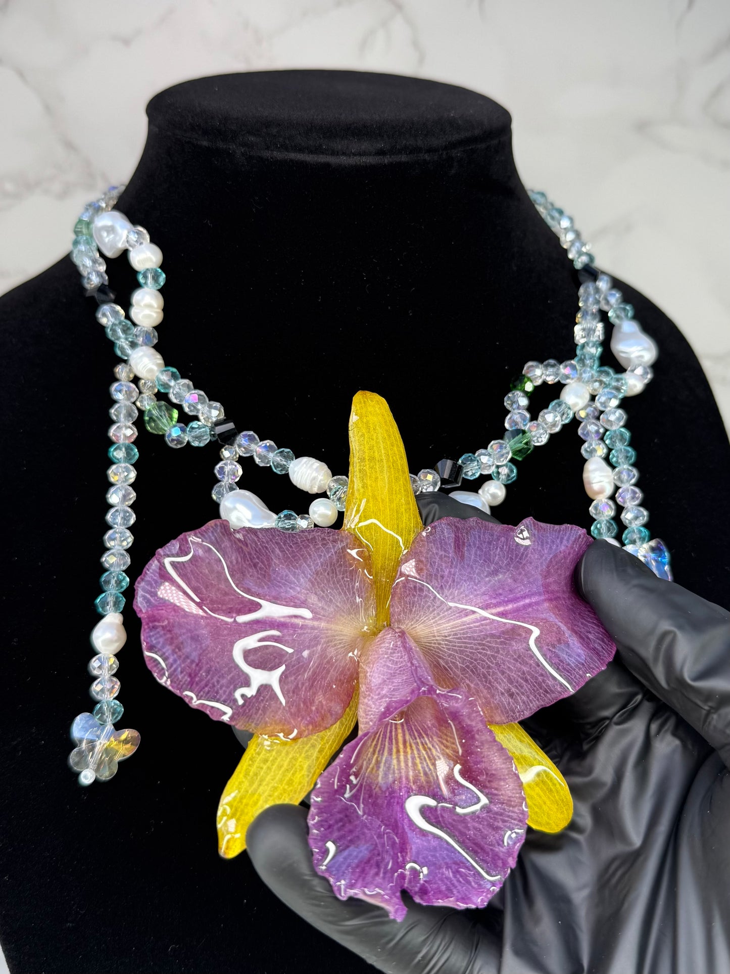 Oceanlight Cattleya Bloom Purple & Yellow Cattleya Orchid Necklace – Clear & Light Blue Crystal Beads