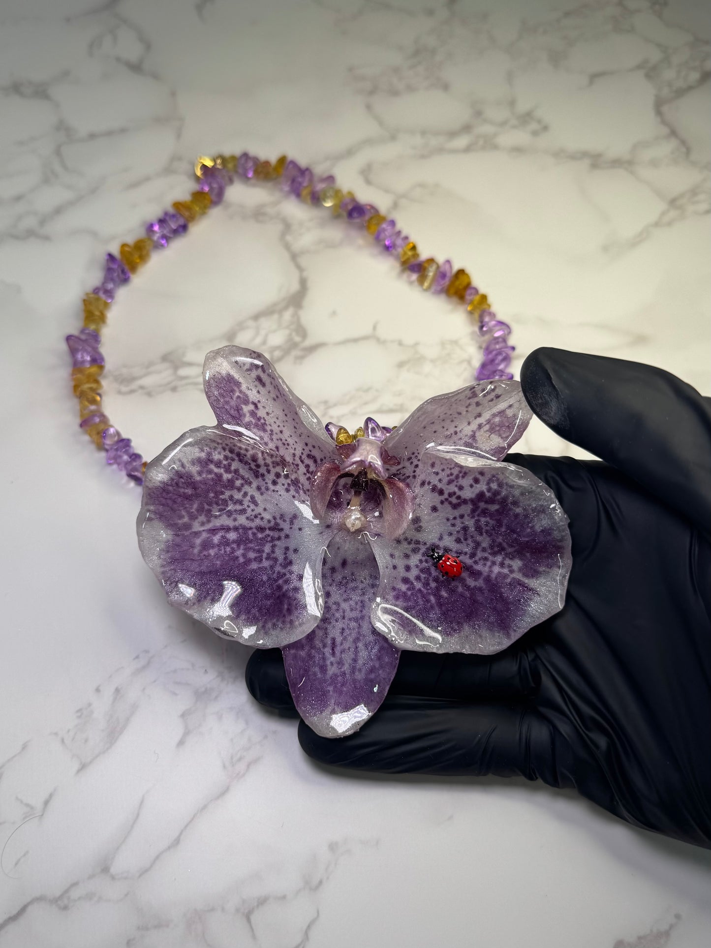 The Garden Whisper – Orchid & Ladybug Charm