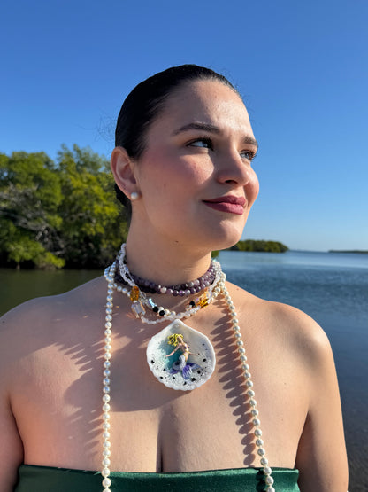 Aqualis – LIMITED EDITION – NYFW EXHIBITION PIECE Natural Seashell Art Necklace with Hand-Carved White-to-Purple Mermaid, Clear Crystals, Black Accents and Purple & Amber Crystal Necklace