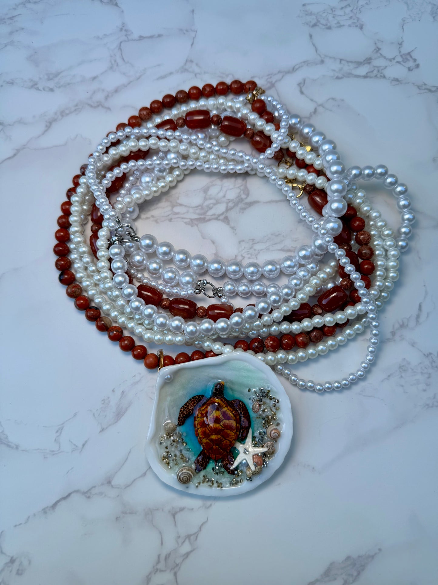 Tyrionis – LIMITED EDITION – NYFW EXHIBITION PIECE Handmade Natural Seashell Necklace with Handcrafted Brown Sea Turtle, Natural Sand, Starfish and Shell Accents, Brown, Red & Crimson Glass Beads and Crystal Pearls
