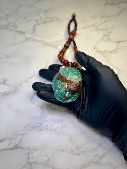 Amber Tide Spark Natural seashell featuring a miniature orange-and-black spotted crab and many tiny clear glass balls