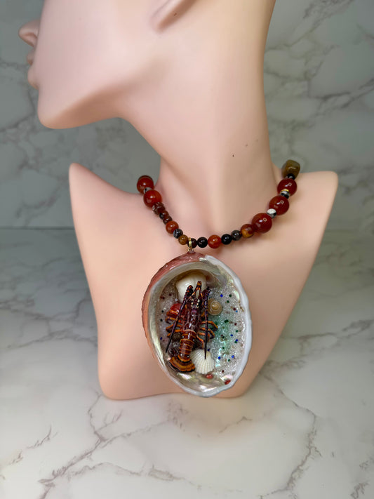 Scarlet Shore Vibrant red abalone seashell featuring a metal handmade craft realistic lobster, tiny natural shells, and a red crystal pendant encapsulated in clear UV resin Limited Edition