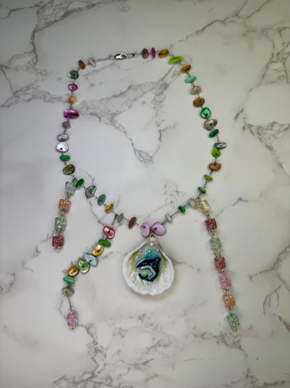 Rainbow Reef Hunter Tiny natural seashell featuring a miniature shark and multicolored glass rock beads (red, green, yellow, blue) encapsulated in clear UV resin stainless steel chain.
