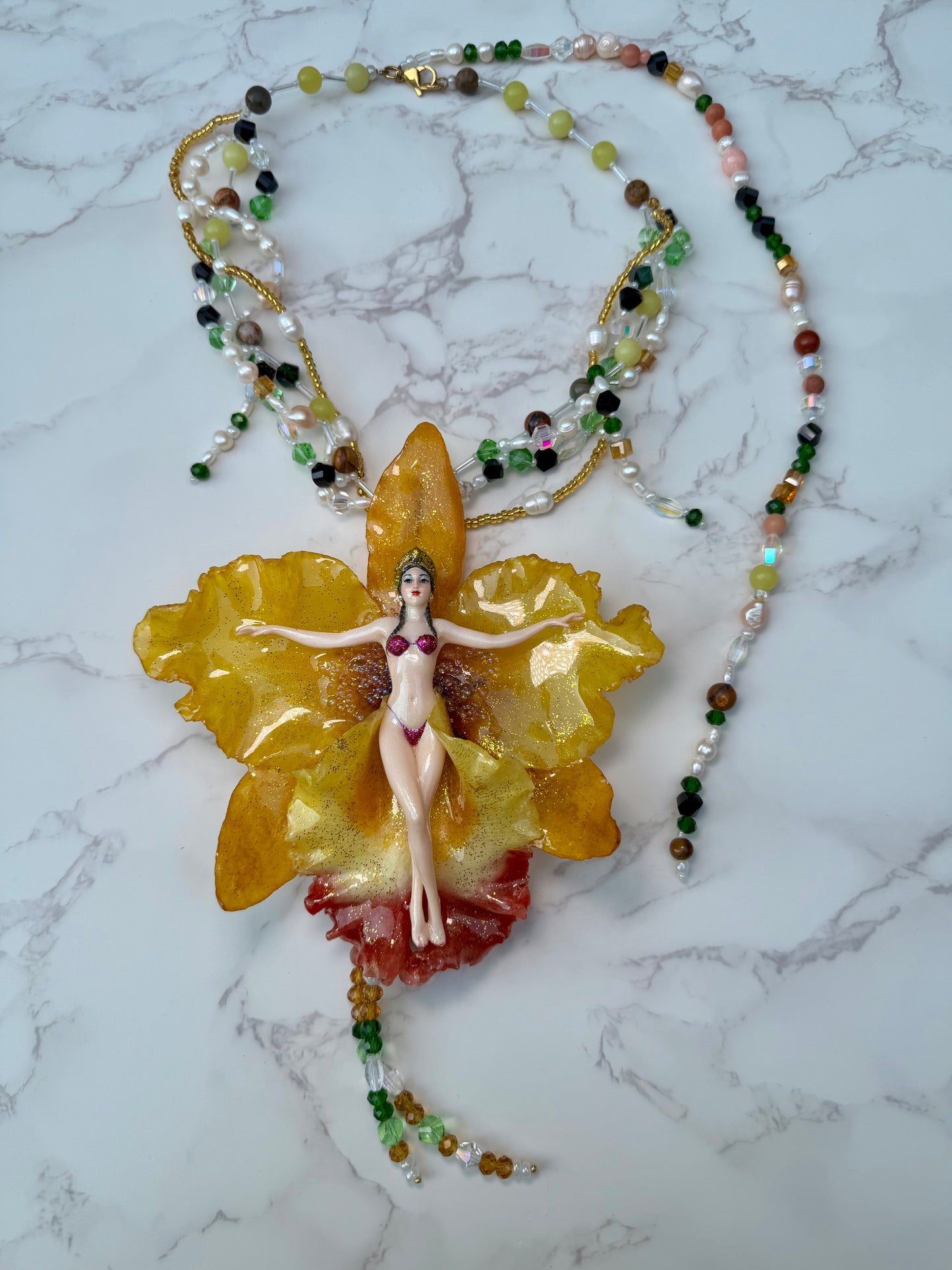 Helia – LIMITED EDITION – NYFW EXHIBITION PIECE Handmade Real Yellow Orchid Art Necklace with Hand-Carved Female Figure, Freshwater Pearls and Multitone Crystal Details