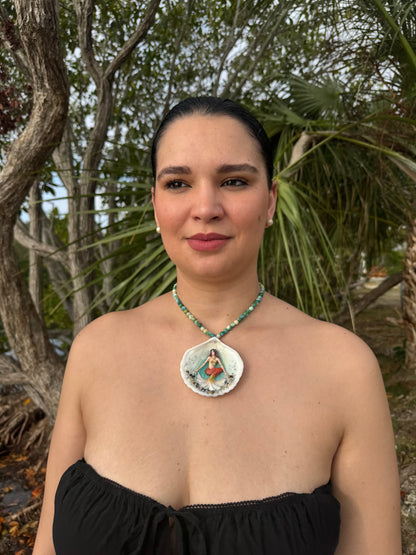 Sunlit Coral Siren Natural seashell featuring a handmade craft metal mermaid with brown hair, yellow highlights, and an orange–yellow tail encapsulated in clear UV resin Beautiful semiprecious stones necklace