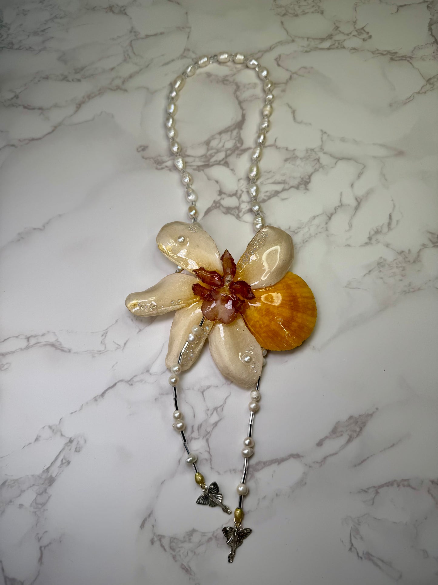 The Sunset Bloom – Cattleya & Seashell Harmony