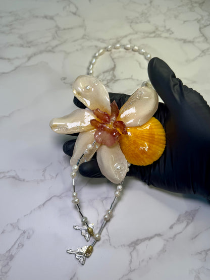 The Sunset Bloom – Cattleya & Seashell Harmony