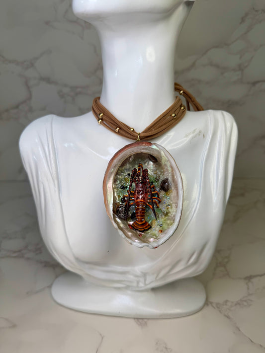 Crimson Tide Natural seashell featuring a miniature realistic lobster and tiny natural shells encapsulated in clear UV resin