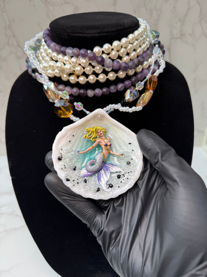 Aqualis – LIMITED EDITION – NYFW EXHIBITION PIECE Natural Seashell Art Necklace with Hand-Carved White-to-Purple Mermaid, Clear Crystals, Black Accents and Purple & Amber Crystal Necklace