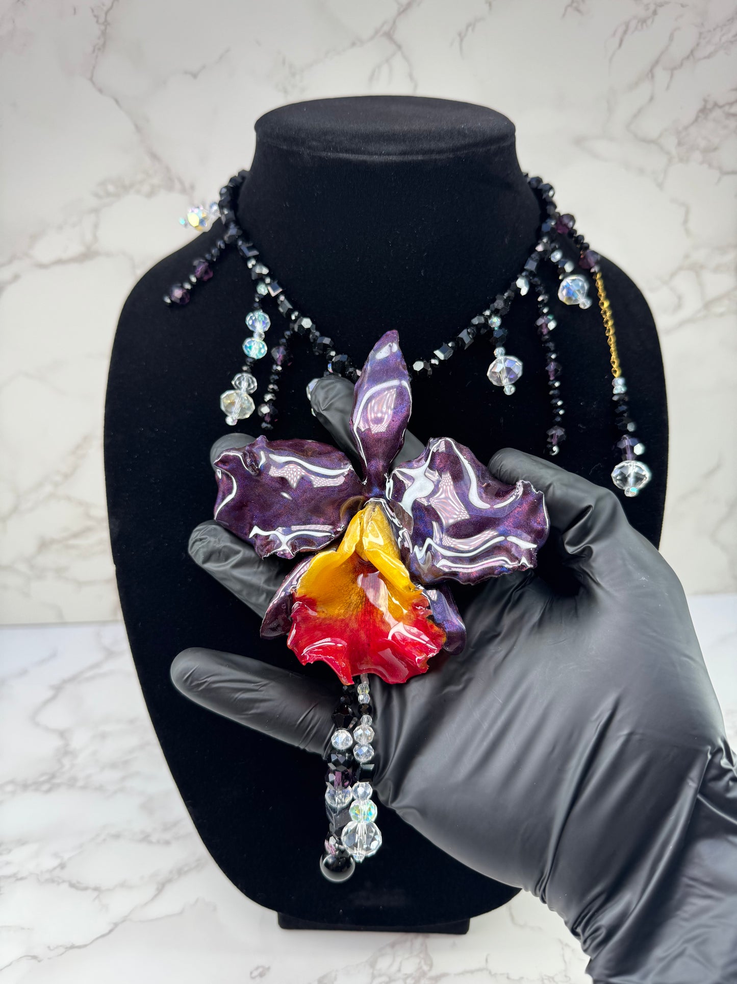 Midnight Cattleya Radiance Golden & Dark Purple Cattleya Orchid Necklace – Black Crystal Beads with Clear Crystal Accents