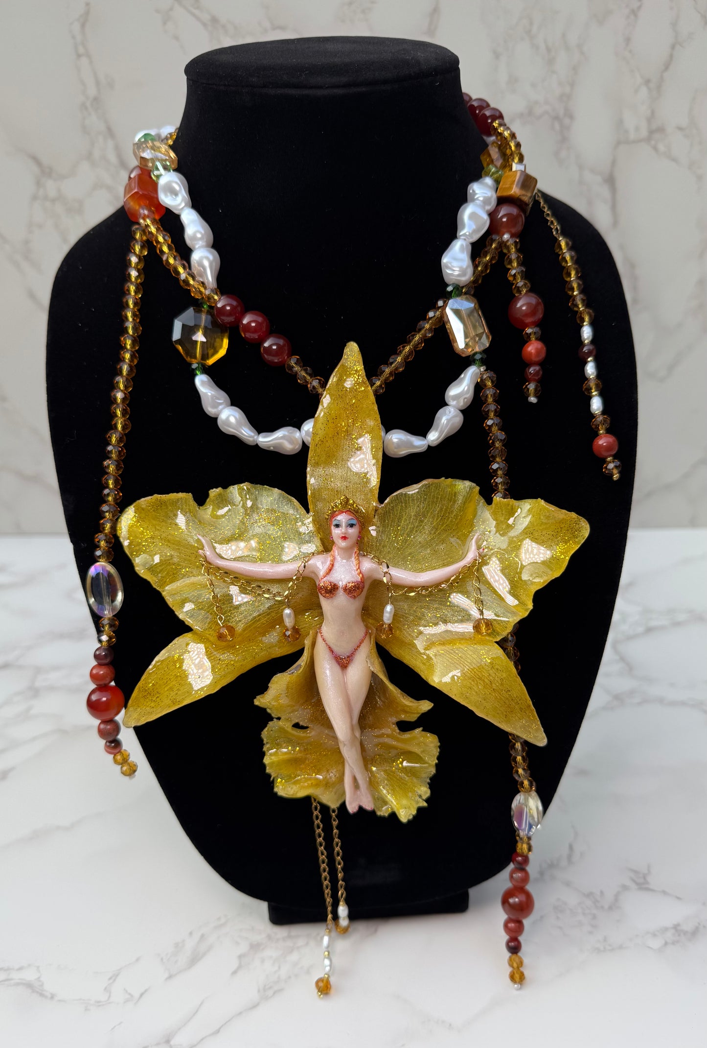 Aurelia – LIMITED EDITION – NYFW EXHIBITION PIECE Real Yellow Cattleya Orchid Necklace with Hand-Carved Female Figure, Amber Crystal and White Pearl Details