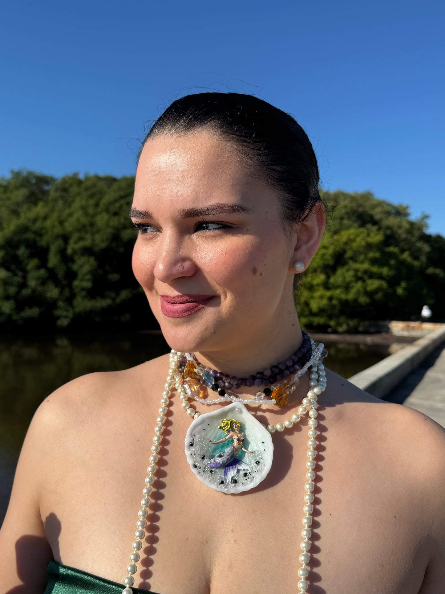 Aqualis – LIMITED EDITION – NYFW EXHIBITION PIECE Natural Seashell Art Necklace with Hand-Carved White-to-Purple Mermaid, Clear Crystals, Black Accents and Purple & Amber Crystal Necklace