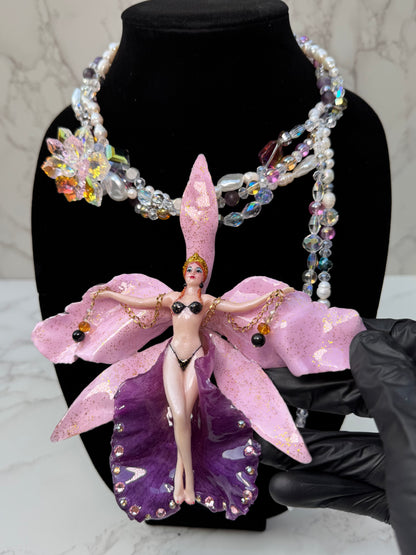 Nyx- LIMITED EDITION – NYFW EXHIBITION PIECE Real Purple and Light Pink Cattleya Orchid Necklace with Hand-Carved Female Figure, with Clear Crystals, Pink Details and Freshwater Pearls