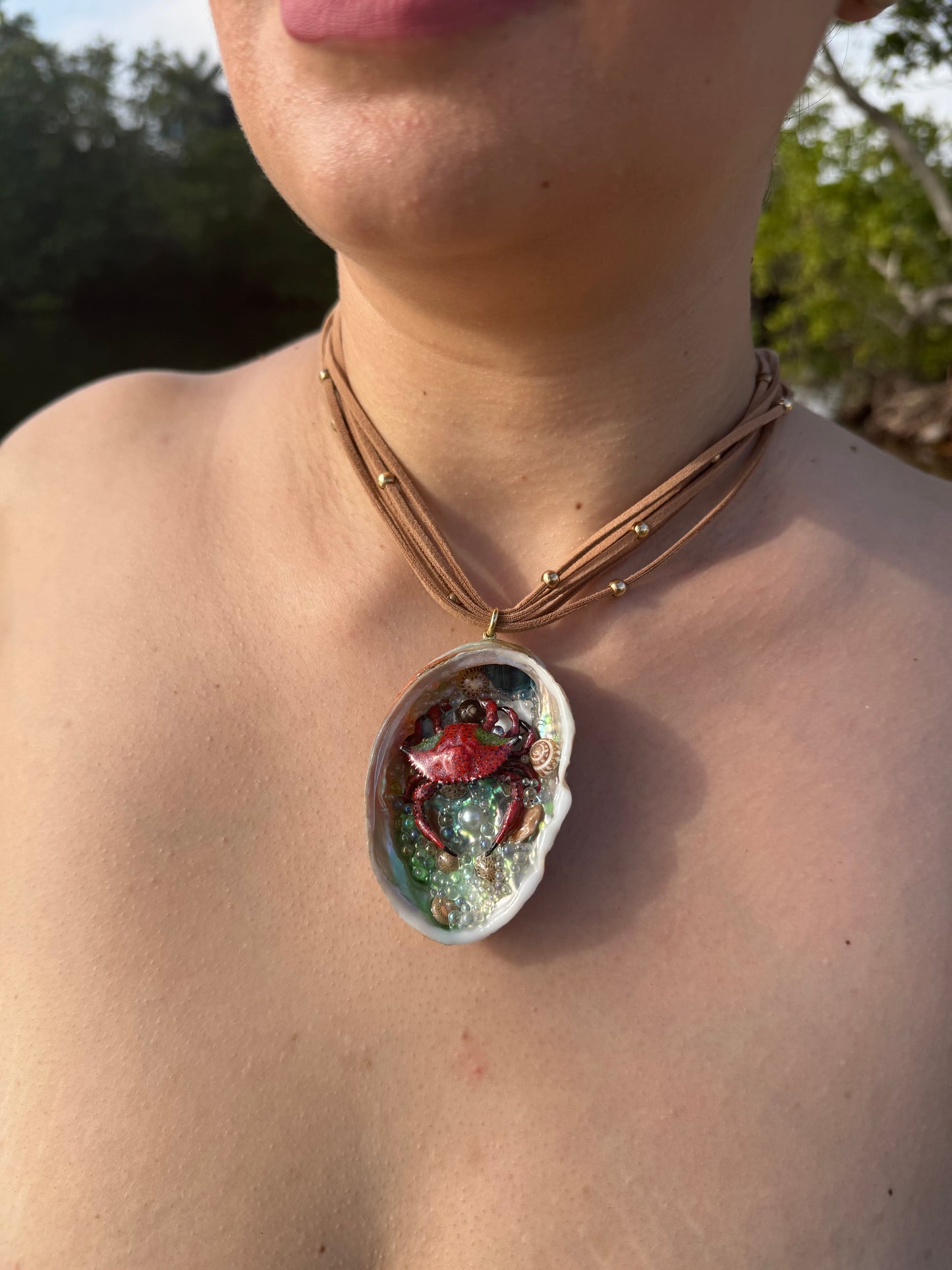 Crimson Cove Keeper Natural abalone seashell featuring a metal handmade red-and-black dotted crab, multiple tiny seashells, and small glass balls encapsulated in clear UV resin Beautiful extra large brown Leather Necklace