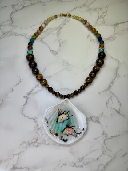 Twin Reef Drifters Natural seashell featuring two miniature hogfish and a brown crystal necklace encapsulated in clear UV resin