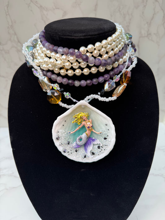 Aqualis – LIMITED EDITION – NYFW EXHIBITION PIECE Natural Seashell Art Necklace with Hand-Carved White-to-Purple Mermaid, Clear Crystals, Black Accents and Purple & Amber Crystal Necklace
