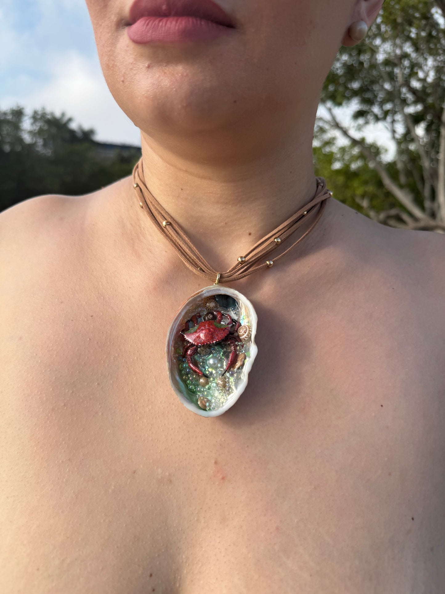 Crimson Cove Keeper Natural abalone seashell featuring a metal handmade red-and-black dotted crab, multiple tiny seashells, and small glass balls encapsulated in clear UV resin Beautiful extra large brown Leather Necklace