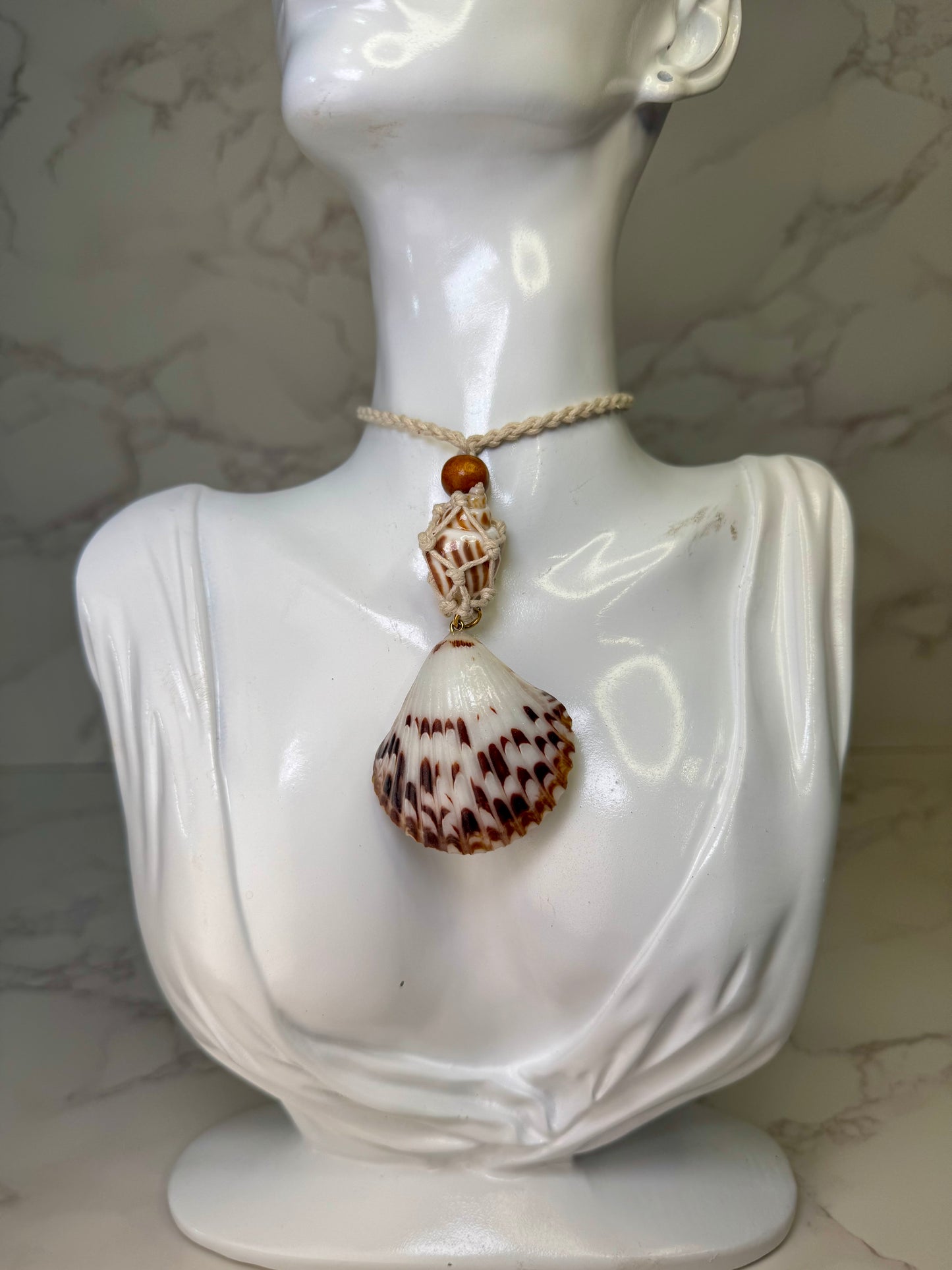 Sunny Shore Drift Natural seashell featuring a handmade metal yellow pufferfish with black spots, tiny red starfish, and delicate sand bits preserved in clear UV resin Beautiful corded necklace