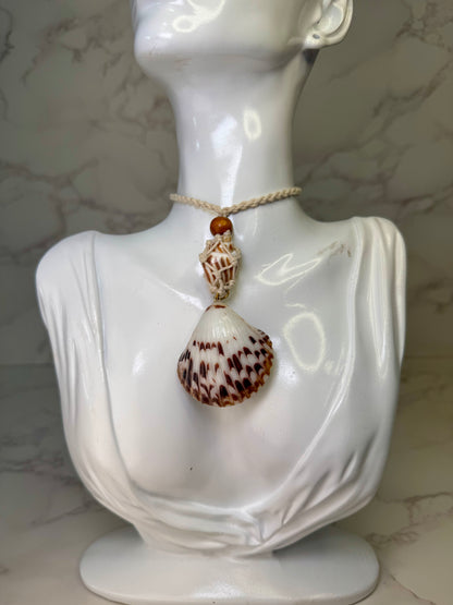 Sunny Shore Drift Natural seashell featuring a handmade metal yellow pufferfish with black spots, tiny red starfish, and delicate sand bits preserved in clear UV resin Beautiful corded necklace