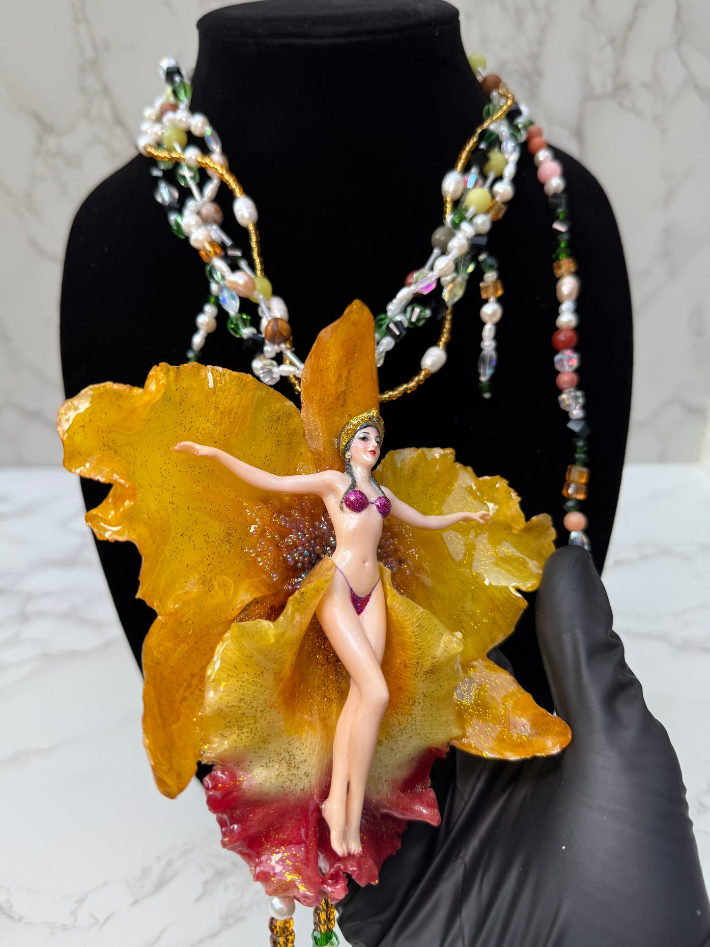 Helia – LIMITED EDITION – NYFW EXHIBITION PIECE Handmade Real Yellow Orchid Art Necklace with Hand-Carved Female Figure, Freshwater Pearls and Multitone Crystal Details