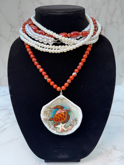 Tyrionis – LIMITED EDITION – NYFW EXHIBITION PIECE Handmade Natural Seashell Necklace with Handcrafted Brown Sea Turtle, Natural Sand, Starfish and Shell Accents, Brown, Red & Crimson Glass Beads and Crystal Pearls