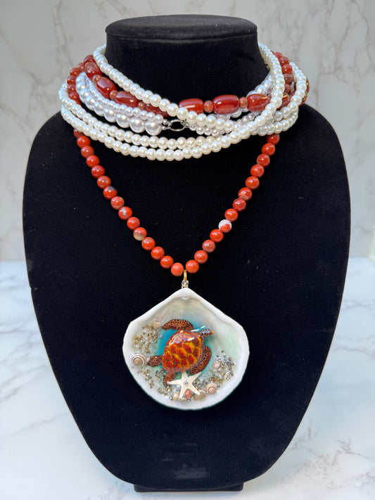 Tyrionis – LIMITED EDITION – NYFW EXHIBITION PIECE Handmade Natural Seashell Necklace with Handcrafted Brown Sea Turtle, Natural Sand, Starfish and Shell Accents, Brown, Red & Crimson Glass Beads and Crystal Pearls