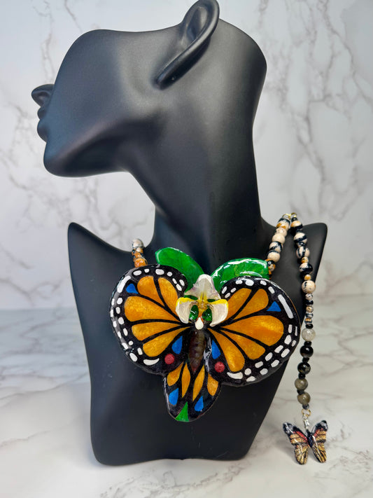 The Orange Wing – Orchid of the Whispering Leaf