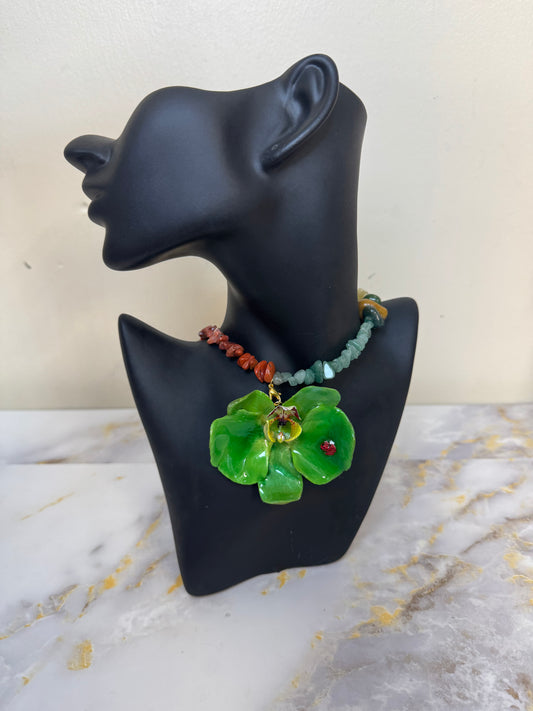 Green Real Orchid Resin Necklace  Real orchid dried in silica gel and preserved in ultraviolet resin Made with Natural Stone Accents small red frog incorporated into the petal