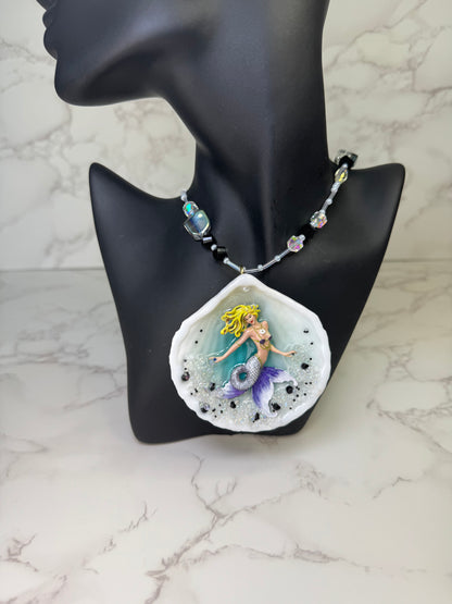Lavender Tides Mermaid Natural seashell featuring a handmade crafted blonde mermaid with a white-and-purple shimmering tail encapsulated in clear UV resin Beauty Natural Necklace
