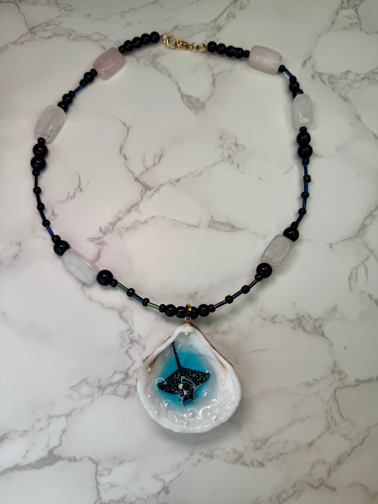 Shadow Tide Natural seashell featuring a handmade craft miniature black manta ray and a black-and-white crystal pendant encapsulated in clear UV resin Beautiful semiprecious beads necklace