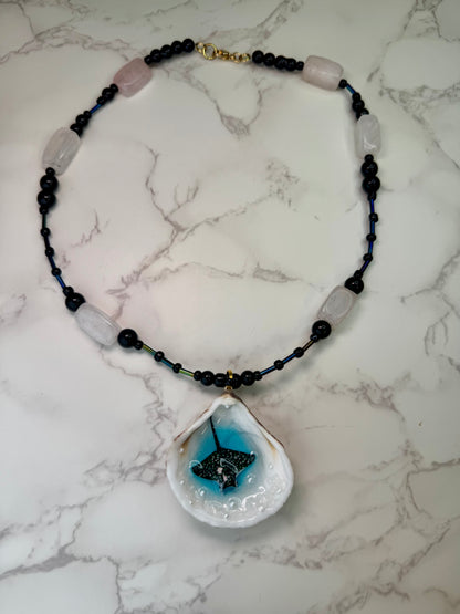 Shadow Tide Natural seashell featuring a handmade craft miniature black manta ray and a black-and-white crystal pendant encapsulated in clear UV resin Beautiful semiprecious beads necklace
