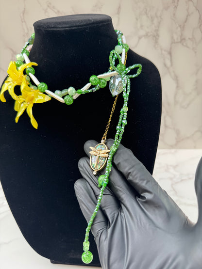 Golden Twin Orchid Grace Two Mini Orchid Orchid Necklace – Green Crystals, Long Pearls, Crystal Heart & Dragonfly on Green Mother-of-Pearl Extension