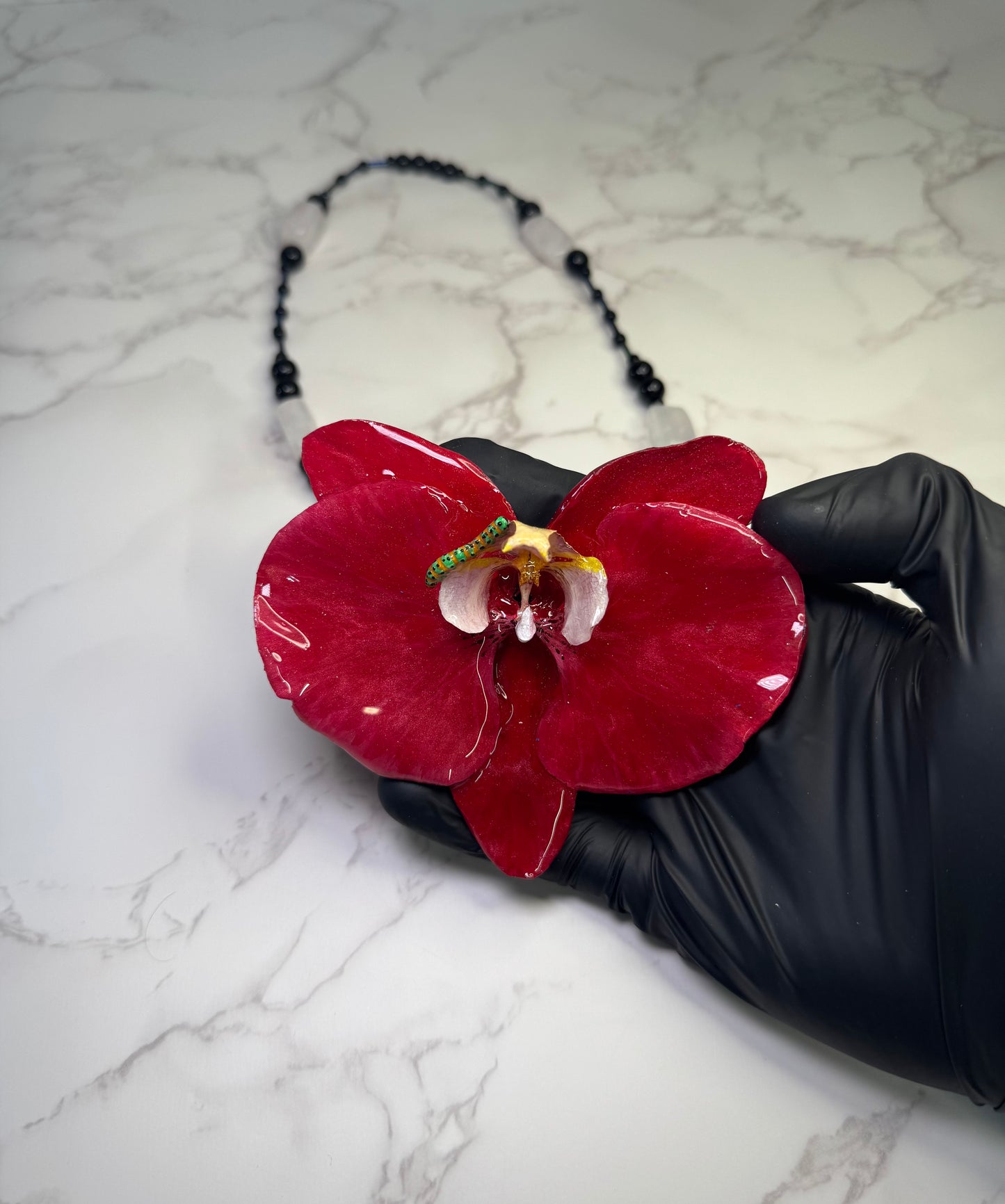 The Scarlet Garden – Orchid & Caterpillar Delight