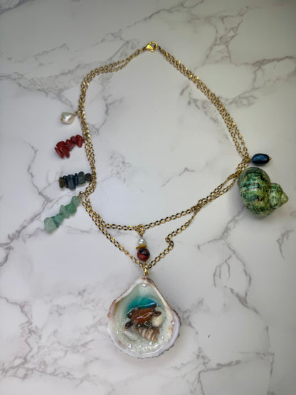 Emerald Tide Traveler Natural seashell with a miniature sea turtle inside