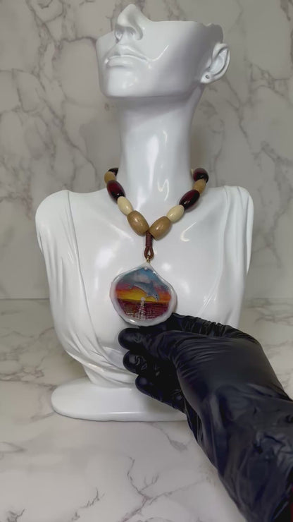 Beautiful Single Dolphin Necklace Handmade Dolphin Necklace Over Painted Ocean Sunset Encapsulated in Real Shell with UV Resin on Leather Cord
